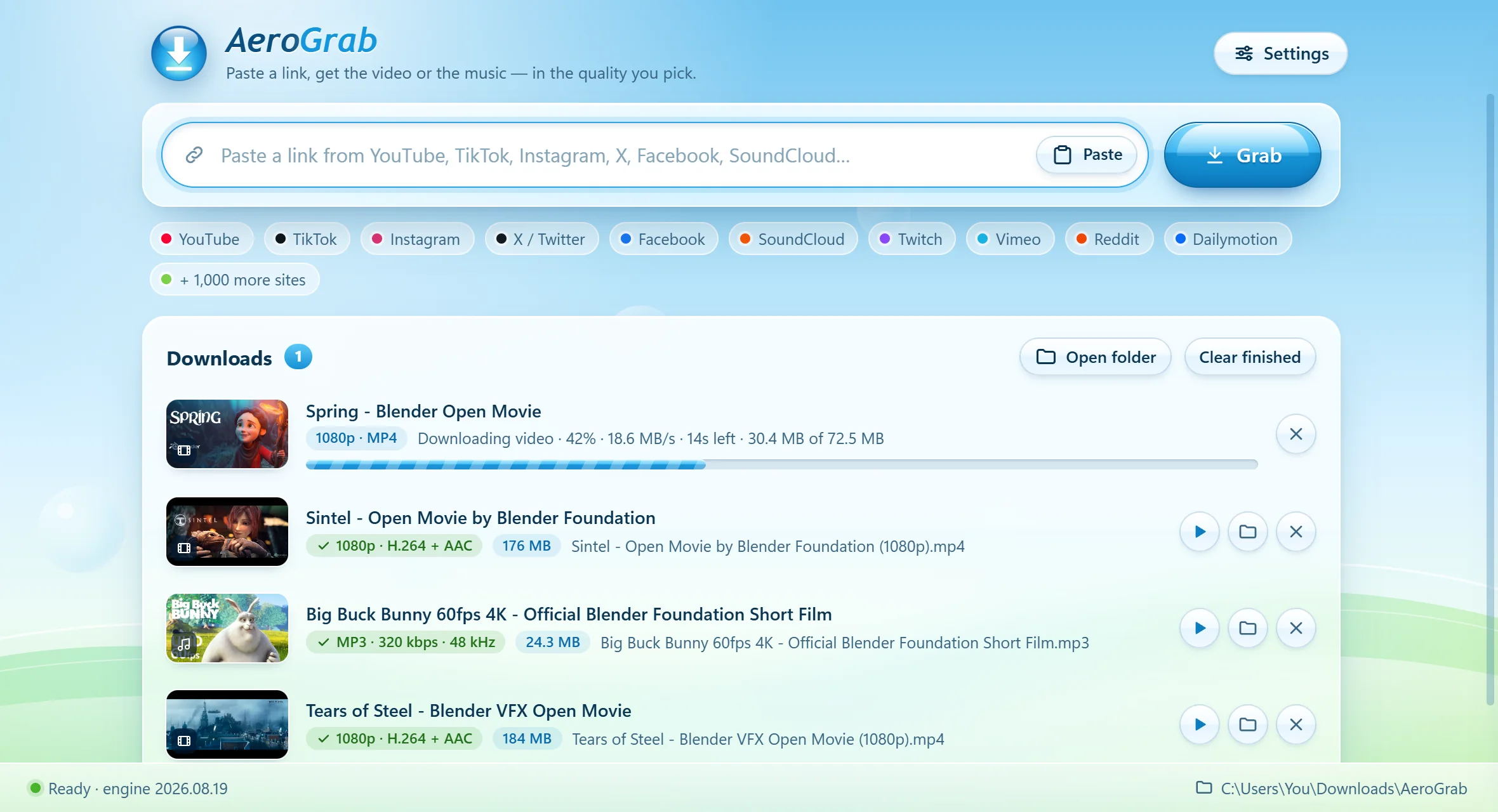 AeroGrab's download list: one download in progress with speed and time left, three finished with a green check showing 1080p H.264 + AAC and MP3 320 kbps 48 kHz
